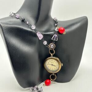 Vintage gold & purple watch pendant.